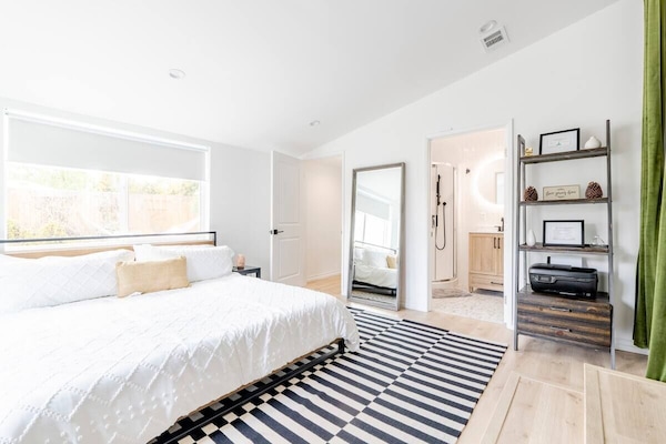 Master suite with dedicated workspace, high-speed WiFi, and serene ambiance.