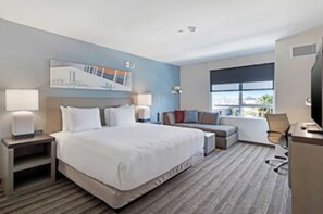 Desk, laptop workspace, blackout drapes, iron/ironing board