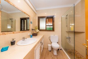 Bathtub, hair dryer, towels