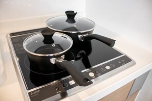 Fridge, microwave, cookware/dishes/utensils