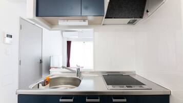 Fridge, microwave, stovetop, cookware/dishes/utensils