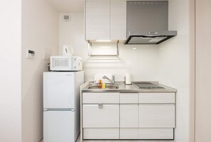 Fridge, microwave, stovetop, cookware/dishes/utensils