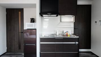 Fridge, microwave, stovetop, cookware/dishes/utensils