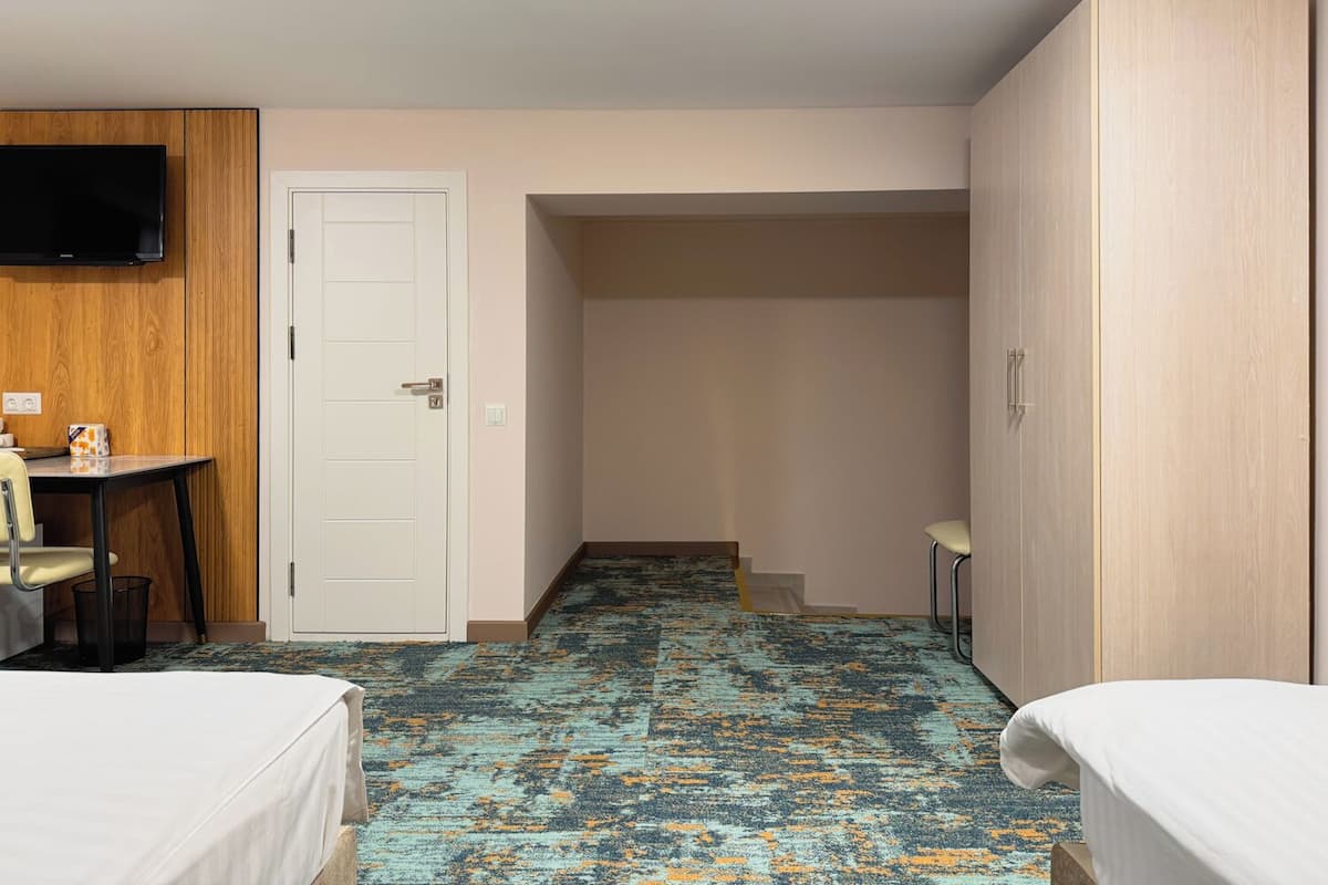 Basic Triple Room | Select Comfort beds, in-room safe, desk, blackout drapes