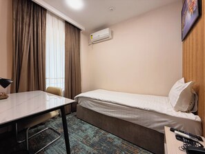 Basic Single Room | Select Comfort beds, in-room safe, desk, blackout drapes - Musafir Hotel (Tashkent)