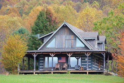 Hand hewn log cabin with beautiful views of the Blue Ridge Mountains 