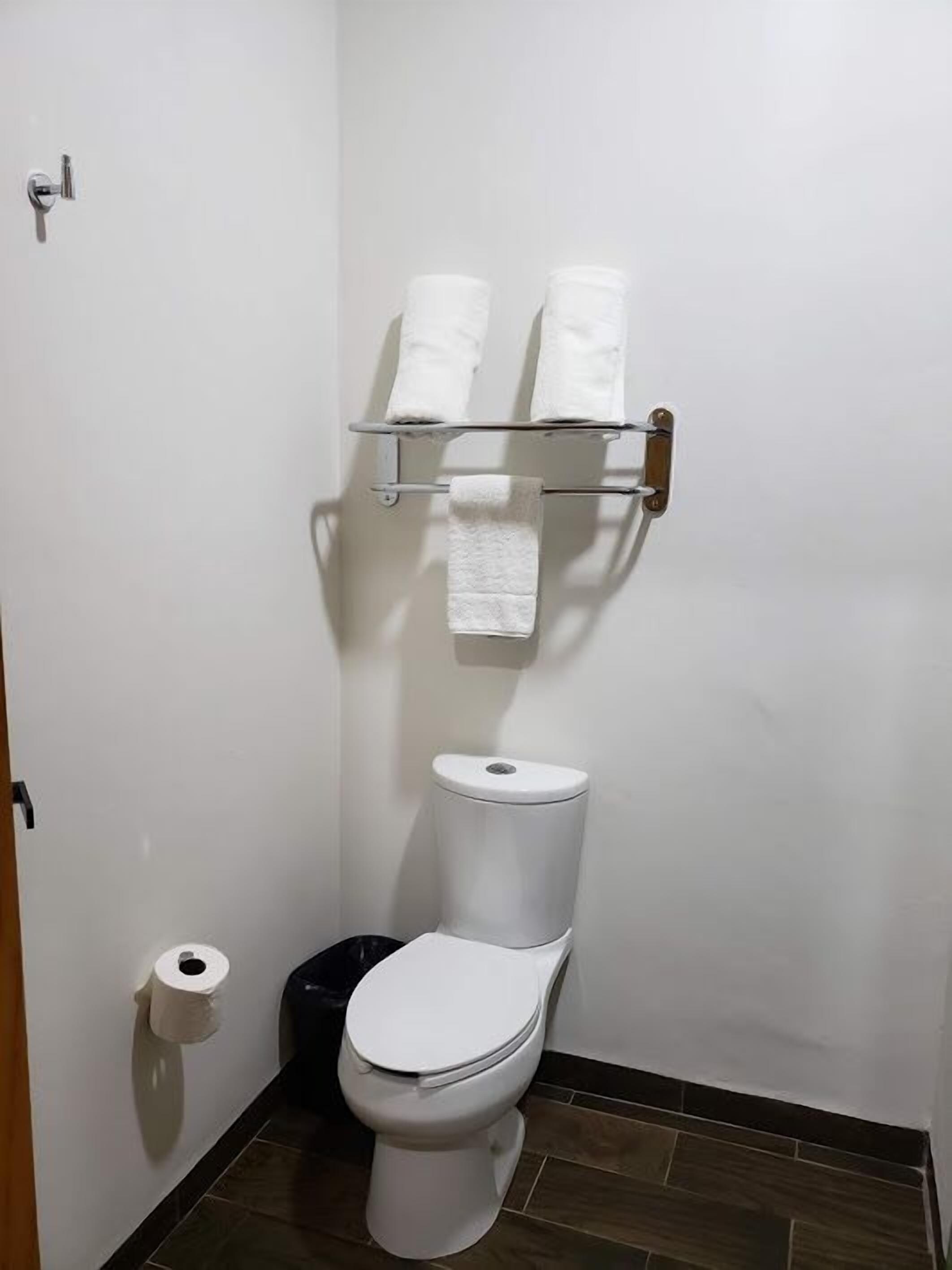 studio suite | desk, laptop workspace, blackout curtains, soundproofing