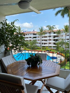 Outdoor dining - Amazing apartment with pool view (Puerto Vallarta)