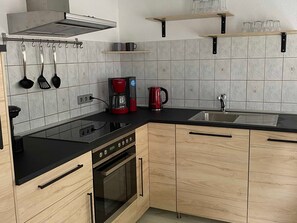 Fridge, oven, dishwasher, coffee/tea maker