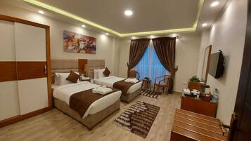 Egyptian cotton sheets, premium bedding, pillow-top beds, minibar