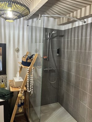 Shower, hair dryer, towels, soap