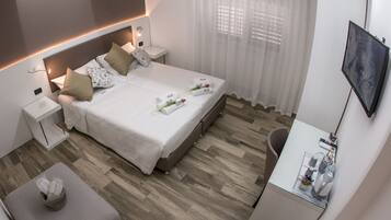 Deluxe-Doppel- oder -Zweibettzimmer | Italienische Bettbezüge von Frette, hochwertige Bettwaren