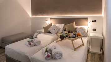 Habitación Deluxe con 1 cama matrimonial o 2 individuales | Sábanas italianas Frette y ropa de cama de alta calidad