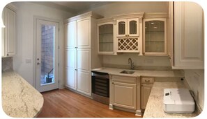 Microwave, dishwasher, coffee/tea maker, cookware/dishes/utensils