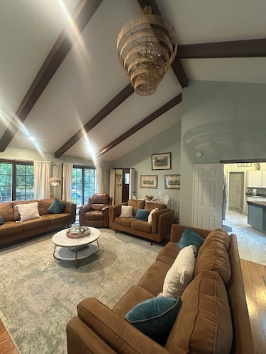 Secluded retreat with private dock and fire pit. Only steps from the beach!