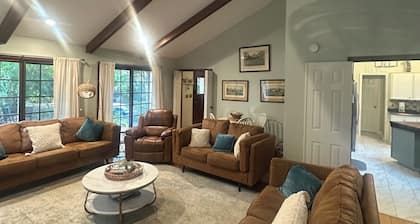 Secluded retreat with private dock and fire pit. Only steps from the beach!