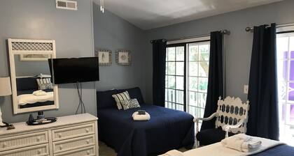 Secluded retreat with private dock and fire pit. Only steps from the beach!