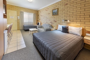 Twin Room | Desk, blackout drapes, iron/ironing board, free WiFi