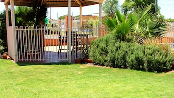 Outdoor pool, open 8:00 AM to 8:30 PM, pool loungers