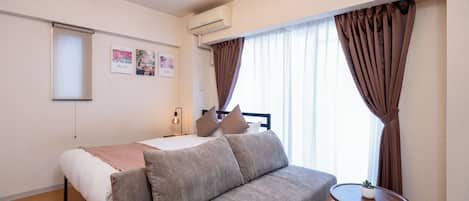 Apartamento City | 1 dormitorio, cortinas opacas, tabla de planchar con plancha