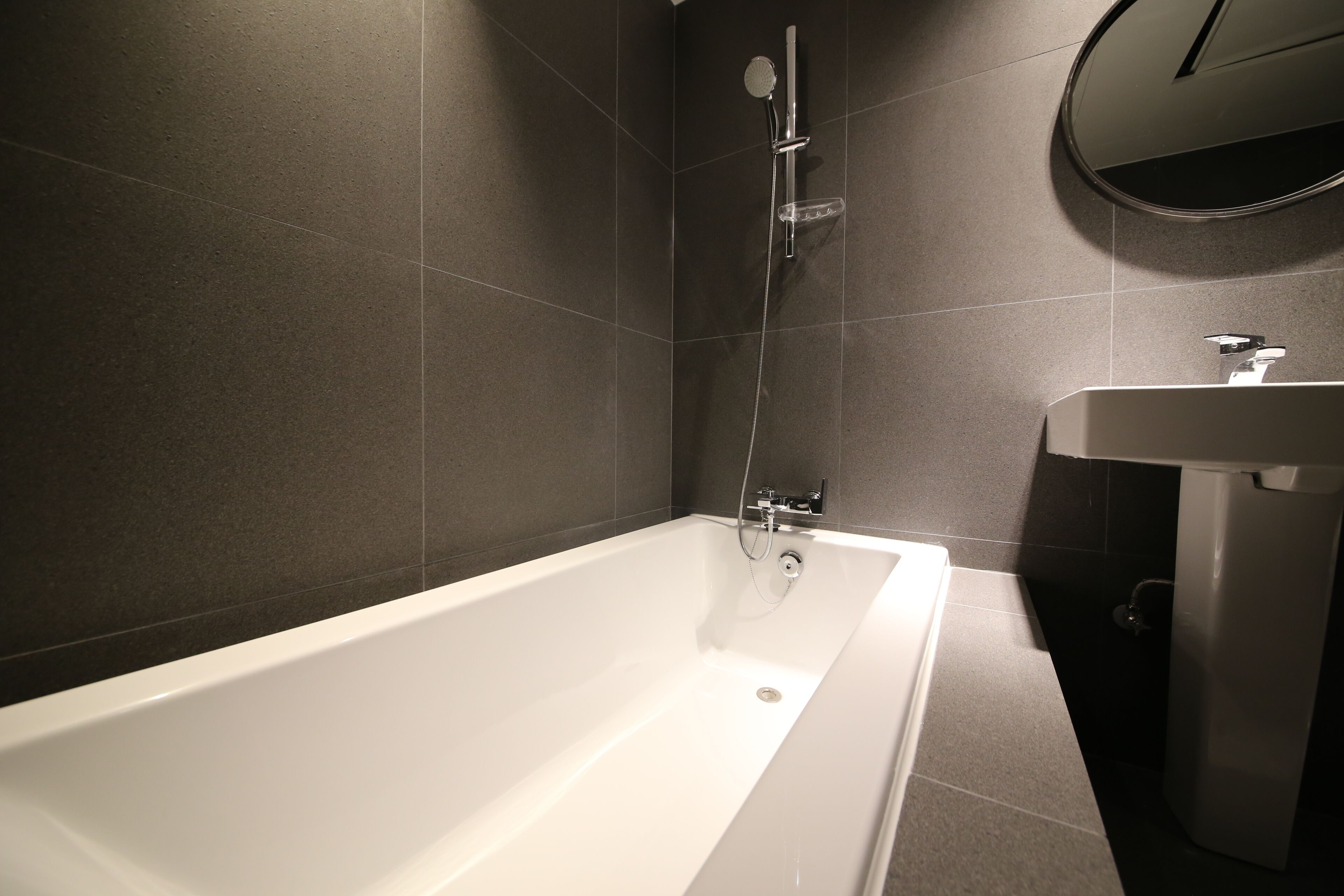 standard room | bathroom | hair dryer, slippers, towels, soap