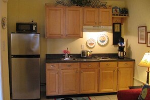 Fridge, microwave, stovetop, coffee/tea maker