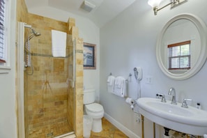 Shower, hair dryer, towels, shampoo