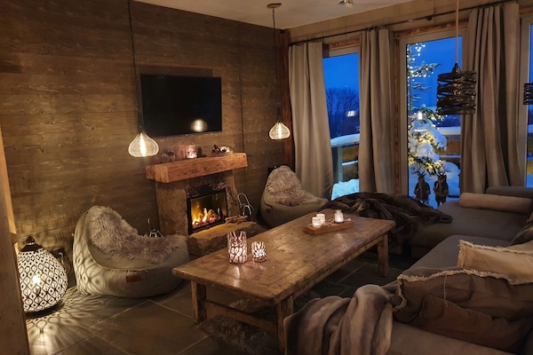Exclusive Condo, Sauna (Panorama Lodge, inkl. 120€ Reinigung) | Living area | 40-inch flat-screen TV with satellite channels, TV, heated floors