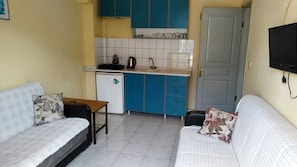 Appartamento (4 People) | Cucina privata | Frigorifero, piano cottura, risottiera, pentole/stoviglie/utensili