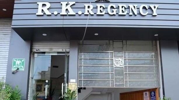 A building with a sign reading "R.K. REGENCY" at the entrance. - Hotel R.K. Regency (Rohtak)
