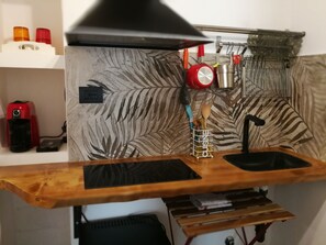 Fridge, microwave, stovetop, coffee/tea maker