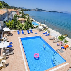 Outdoor pool, open 9:00 AM to 7:00 PM, pool loungers