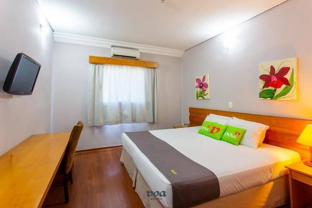 Minibar, desk, bed sheets