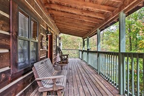 Step out onto the porch and enjoy the serene surroundings.