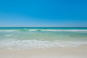 A beach with clear turquoise water and a sandy shore. - Waterscape A135, Ground Floor, Family Fun!, Great Resort! (Fort Walton Beach)