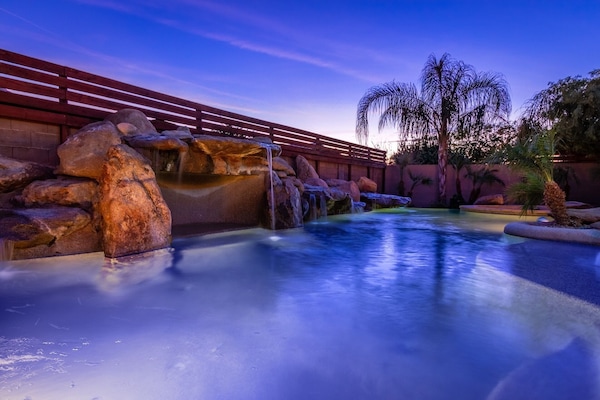 Amazing 300k Resort Style 7 waterfall rock waterfall pool with built in spa.