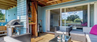 Relax in the hot tub whilst enjoying open views over the golf course and lakes.