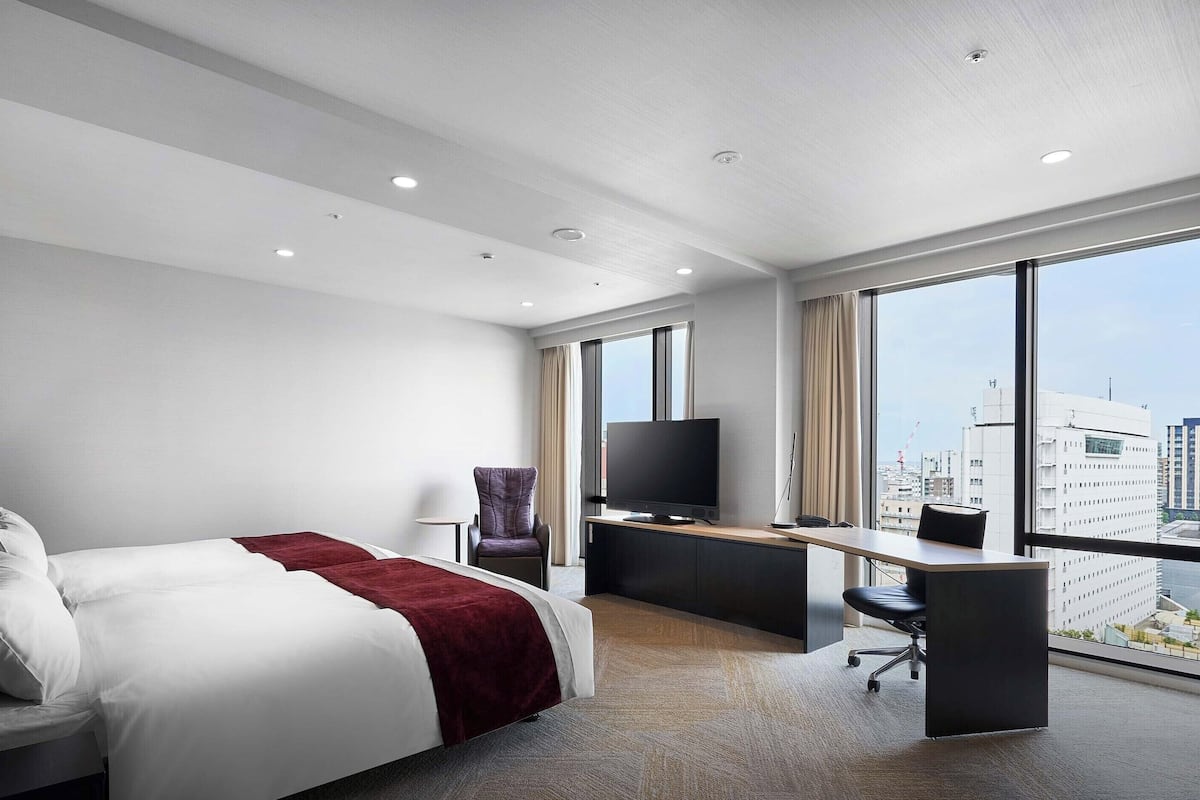 junior suite twin room, non smoking (children sharing a bed: breakfast charged locally.) | 1 bedroom, down duvets, in-room safe, desk