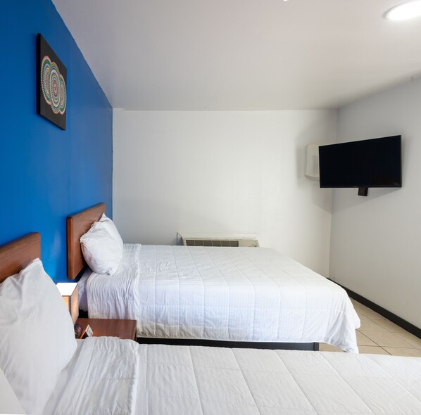 Standard Quadruple Room, 2 Queen Beds, Non Smoking, Refrigerator & Microwave | Desk, iron/ironing board, free WiFi, bed sheets - American Inn (Baton Rouge)