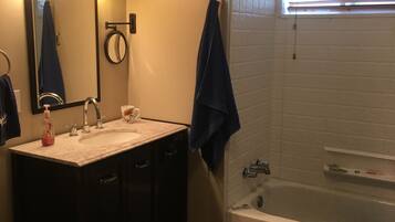 Combined shower/tub, hair dryer, towels, soap