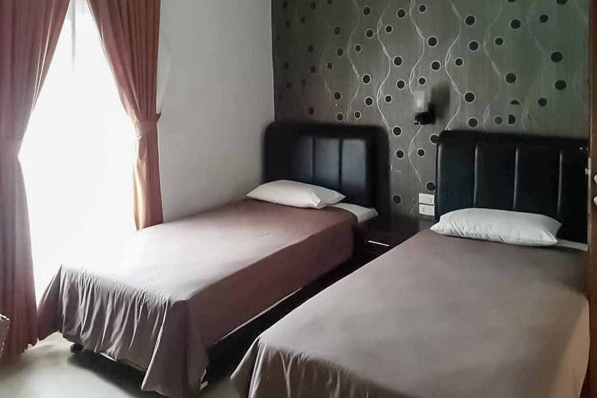 ห้องพรีเมียมทวิน (Reddoorz)