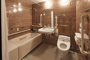 A modern bathroom with a bathtub, a toilet, and a sink. - Prince Smart Inn Atami (Atami)