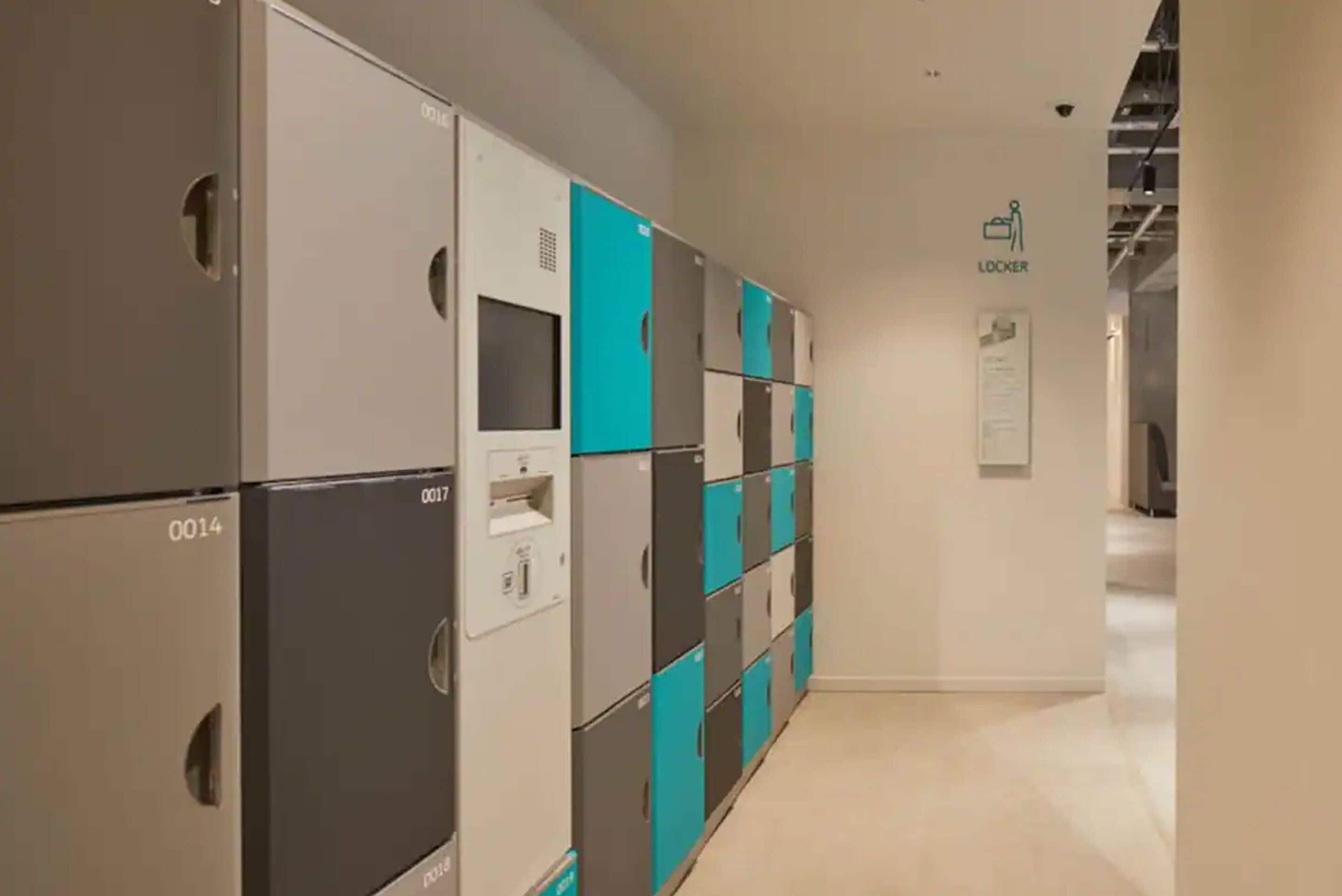 A row of lockers with a sign indicating a locker area.
