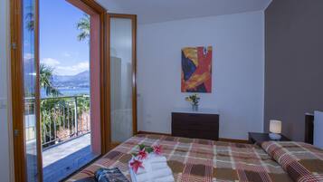 Family Apartment, 2 Bedrooms (Fontana Del Lago Apt. 5) | 2 bedrooms, iron/ironing board, bed sheets