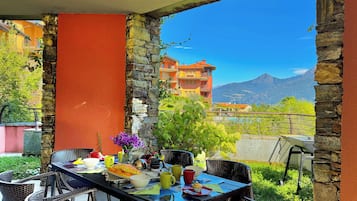 Honeymoon Apartment, Multiple Bedrooms, 2 Bathrooms, Mountainside (La Perla Di Sonenga - Giardino) | Outdoor dining