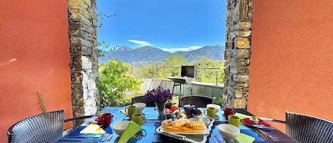 Honeymoon Apartment, Multiple Bedrooms, 2 Bathrooms, Mountainside (La Perla Di Sonenga - Giardino) | Outdoor dining