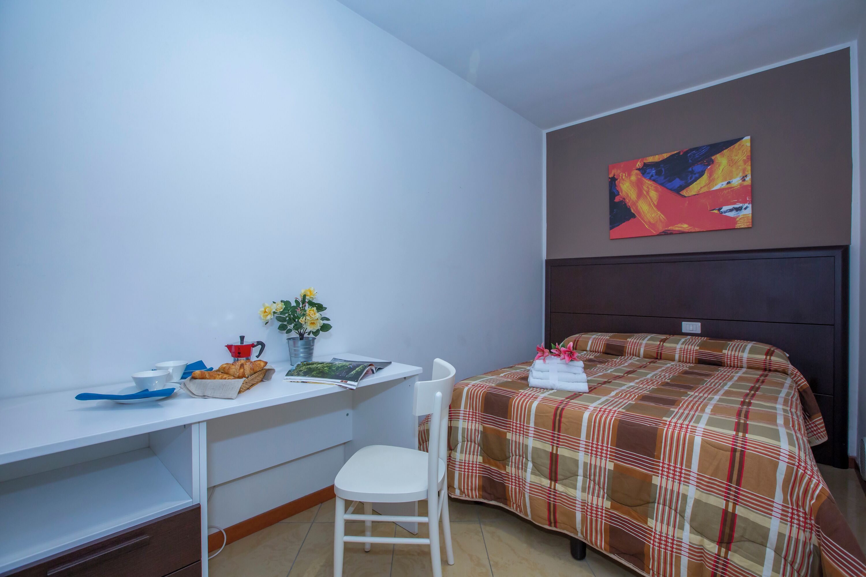 Family Apartment, Multiple Bedrooms (Fontana Del Lago Apt. 5) | 1 bedroom, iron/ironing board, bed sheets