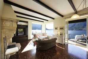 Family Villa, Multiple Beds, Garden Area (Villa Chez Nous) | Living area | Flat-screen TV, fireplace, DVD player