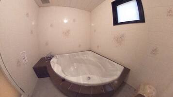 Combined shower/tub, free toiletries, hair dryer, bathrobes