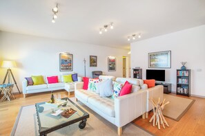 Family Apartment, Multiple Bedrooms, Lakeside (Argegno Fronte Lago) | Living area | 32-inch flat-screen TV with satellite channels, TV, DVD player - Argegno Fronte Lago (Argegno)